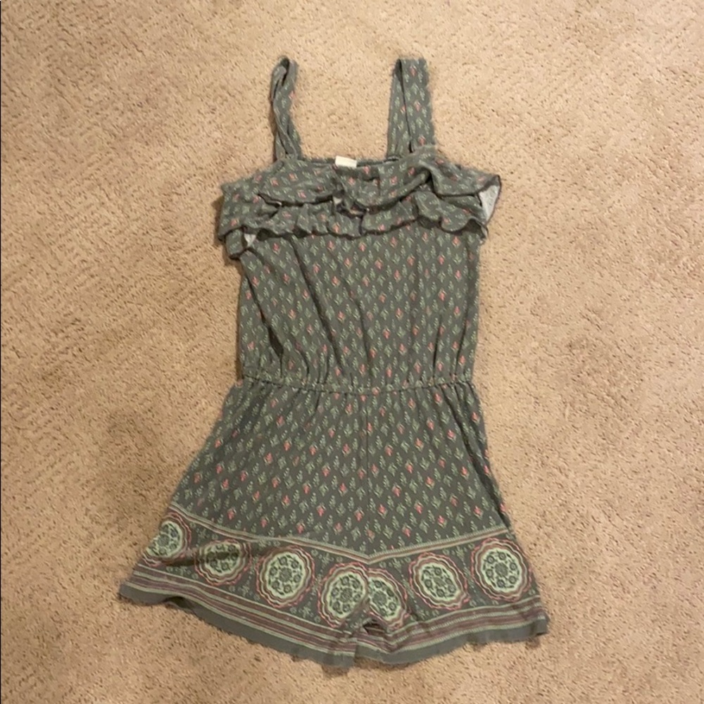 I am selling an olive green jumpsuit.